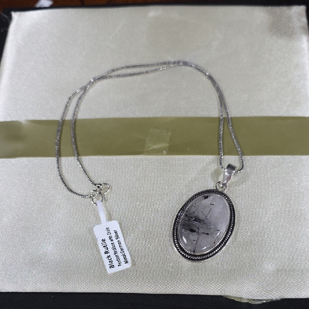Elegant Silver Necklace with Black Pendant